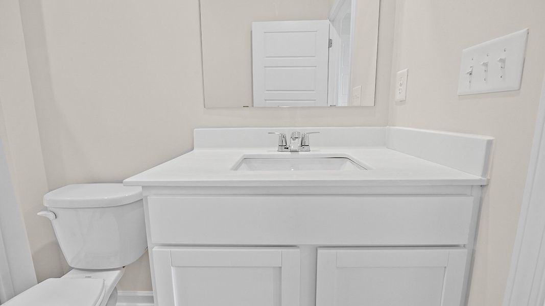 Representative interior finishes for a home built from the Edgewood Express - Duplex by D.R. Horton in Remington Chase, Perry (Image 9).