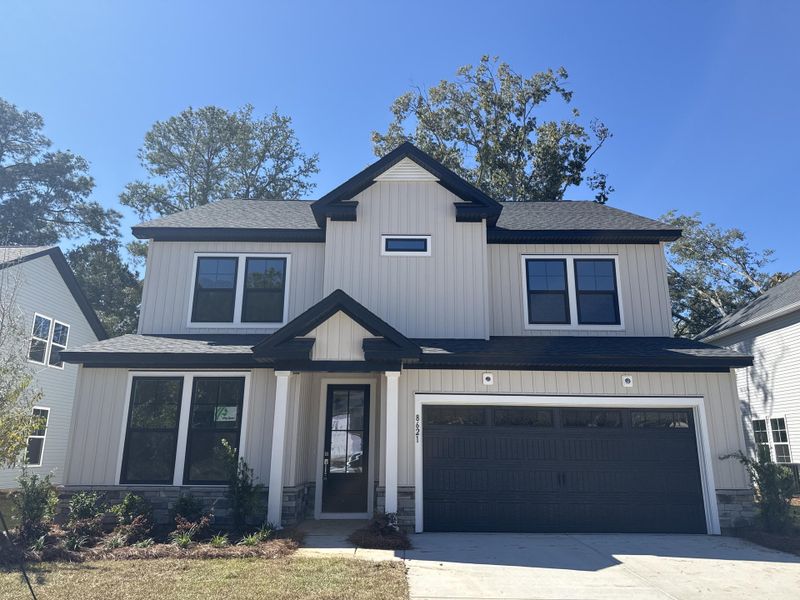 Front exterior of a new home in , North Charleston, SC, highlighting curb appeal (Image 25). Front exterior of a new home in , North Charleston, SC, highlighting curb appeal (Image 25).