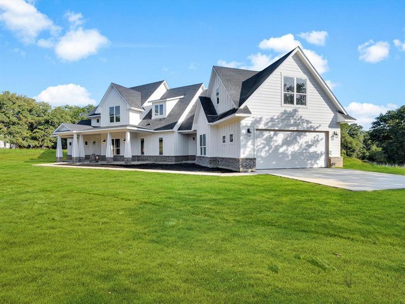 Front exterior of a new home in , Sunset, TX, highlighting curb appeal (Image 2). Front exterior of a new home in , Sunset, TX, highlighting curb appeal (Image 2).