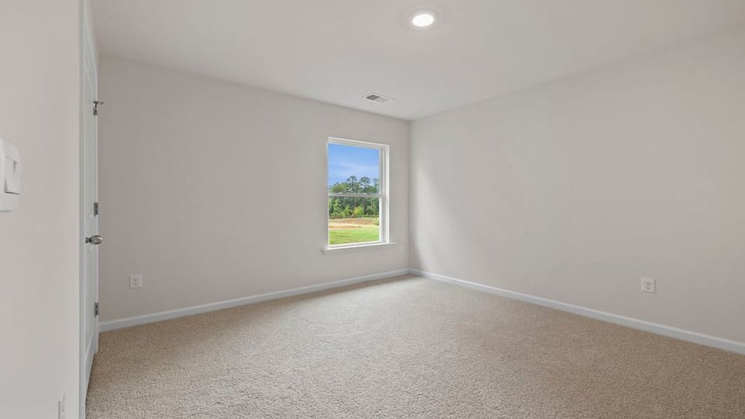 Spacious, unfurnished interior of a new home in Bentley Park, Greenwood (Image 16).