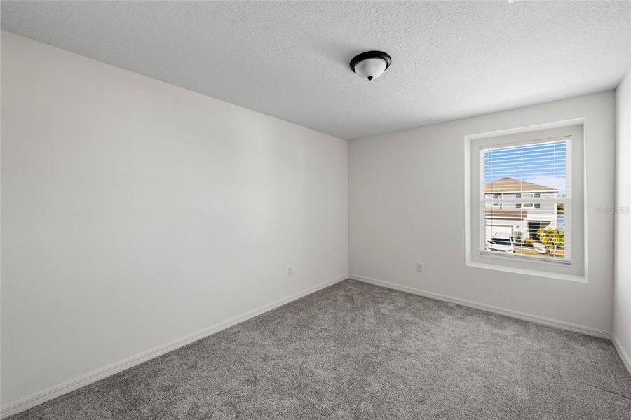 Spacious, unfurnished interior of a new home in Heron Bay, Palmetto (Image 27). Spacious, unfurnished interior of a new home in Heron Bay, Palmetto (Image 27).