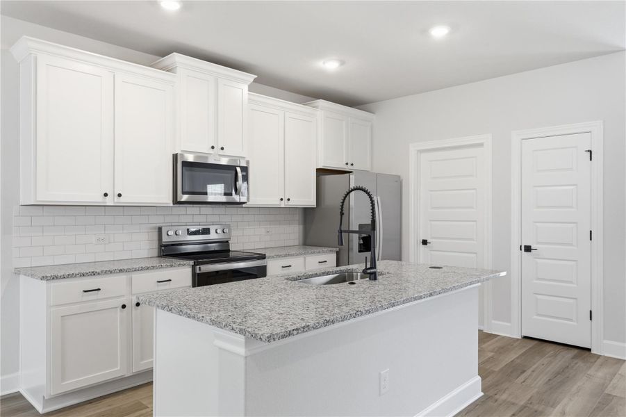 Furnished interior view inside a new home in Whisper Valley, Manor (Image 14).