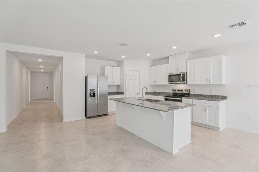 Furnished interior view inside a new home in Deer Run at Crosswinds, Davenport (Image 5).