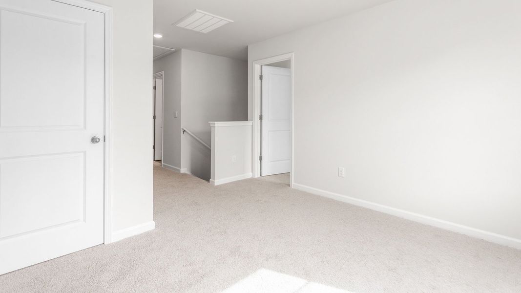 Representative unfurnished interior of a home built from the PENWELL by D.R. Horton in English Farm, Archdale (Image 16).
