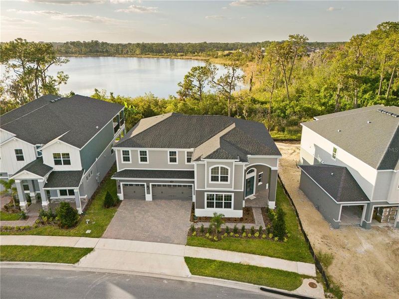 Front exterior of a new home in , Winter Garden, FL, highlighting curb appeal (Image 34). Front exterior of a new home in , Winter Garden, FL, highlighting curb appeal (Image 34).