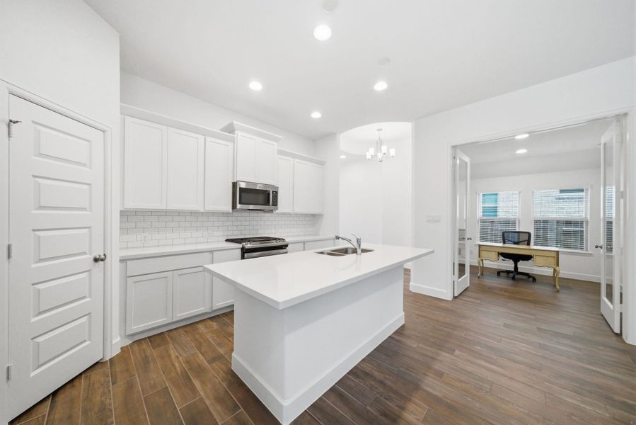 Furnished interior view inside a new home in Artavia, Conroe (Image 13).