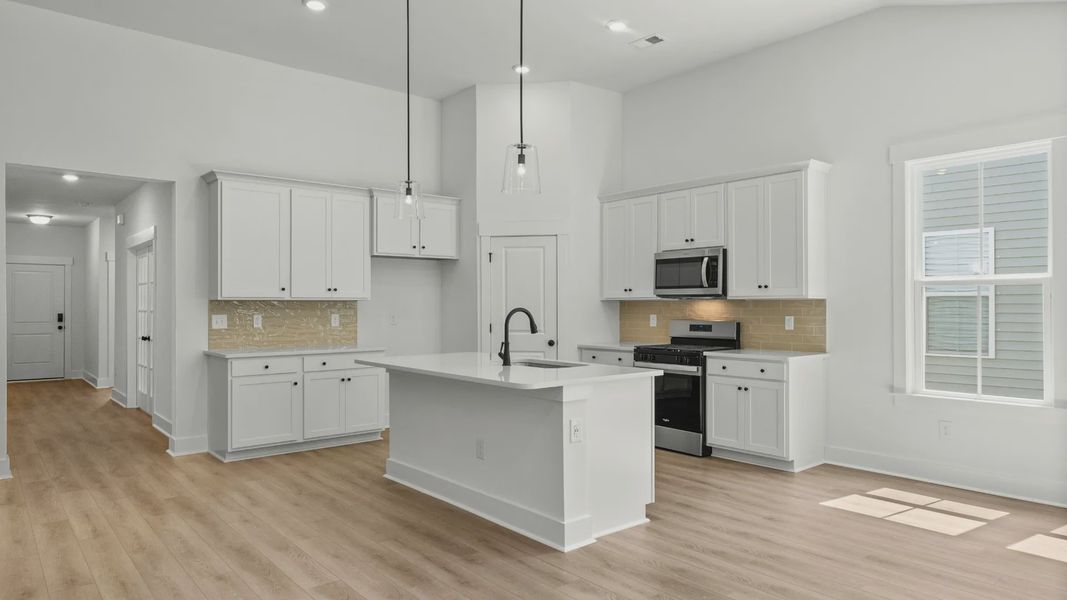 Furnished interior view inside a new home in Bluffs at Sun Colony, Longs (Image 7).