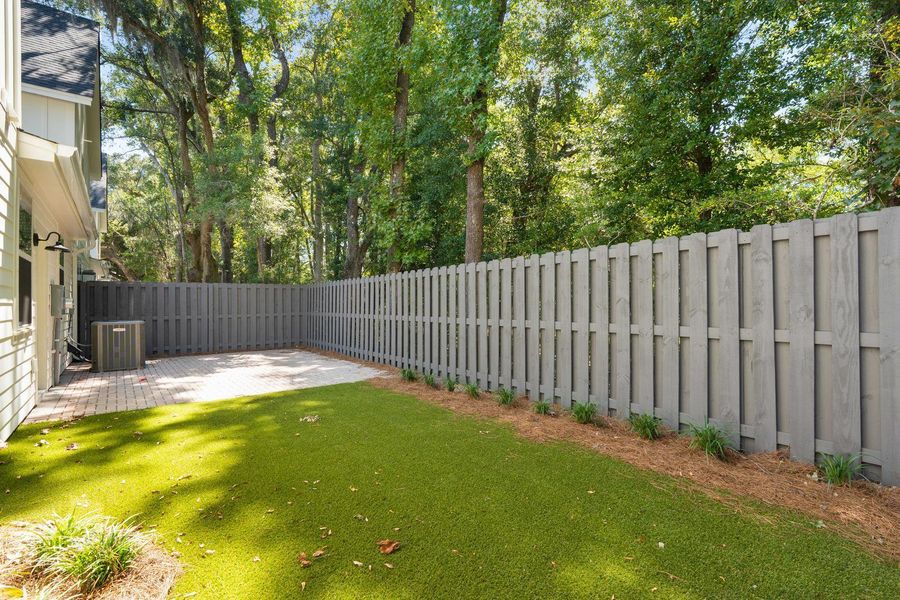 Exterior details and patio area of a home in , Johns Island (Image 25).