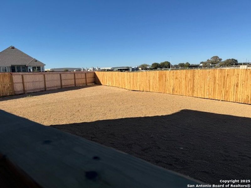 Exterior details and patio area of a home in Megan's Landing 70', Castroville (Image 4).