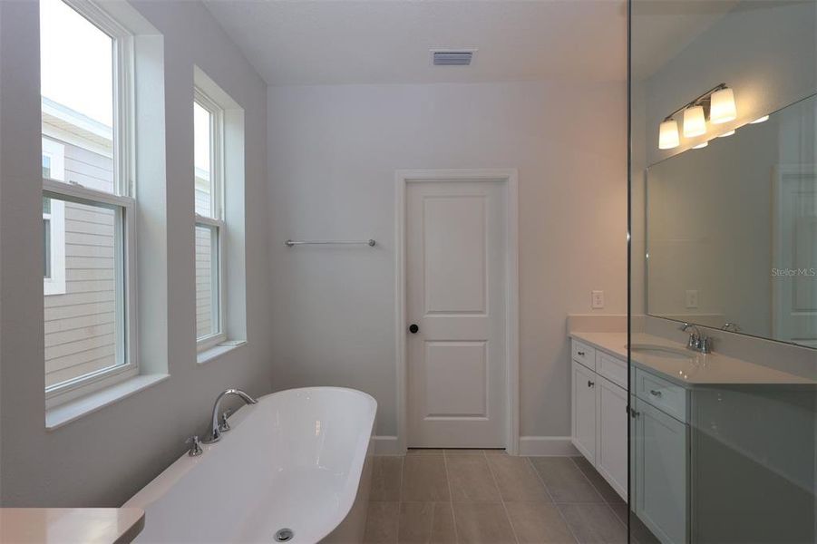 Furnished interior view inside a new home in Lake Star at Ovation, Winter Garden (Image 12).