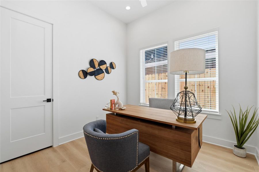 Versatile duplex flex room perfect for a home office, study, or additional living space.