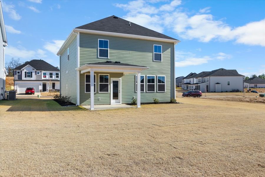 Exterior details and patio area of a home in Windsor, North Augusta (Image 21).