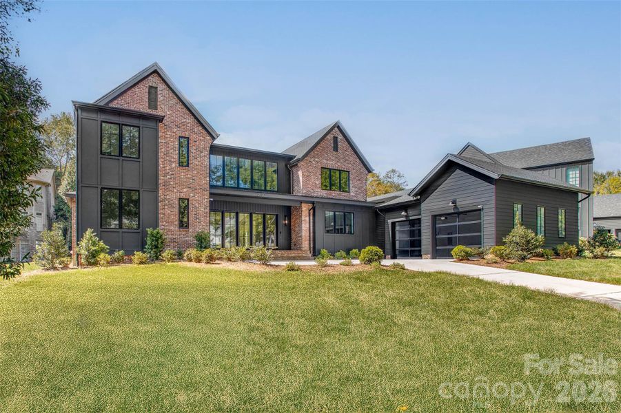 Front exterior of a new home in , Charlotte, NC, highlighting curb appeal (Image 1). Front exterior of a new home in , Charlotte, NC, highlighting curb appeal (Image 1).