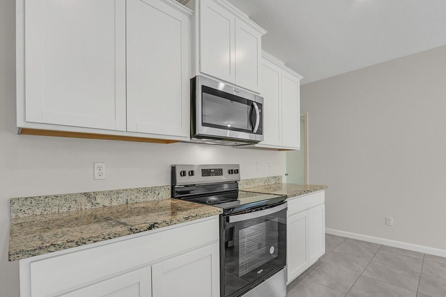 Furnished interior view inside a new home in , Port St. Lucie (Image 4).