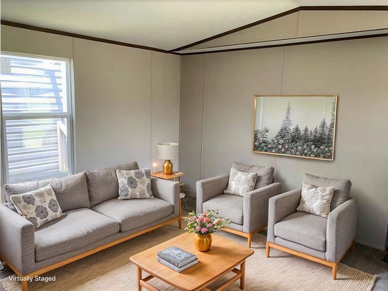 Bedroom featuring hardwood / wood-style flooring, crown molding, and a textured ceiling