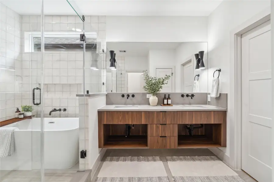 A spa-worthy retreat in your own home—this breathtaking en-suite blends luxury finishes, natural light, and a deep soaking tub for the ultimate place to unwind. A spa-worthy retreat in your own home—this breathtaking en-suite blends luxury finishes, natural light, and a deep soaking tub for the ultimate place to unwind.