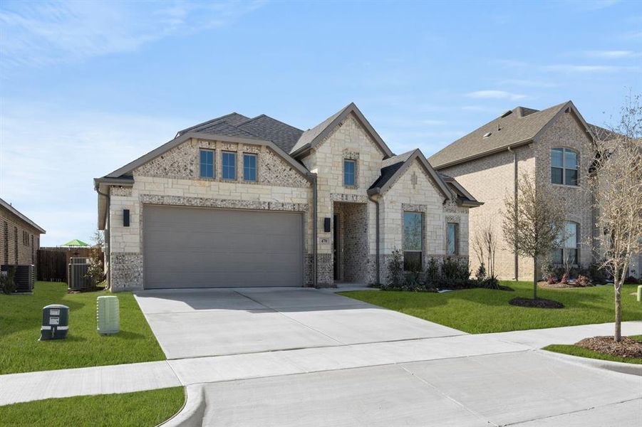 Front exterior of a new home in The Retreat, Waxahachie, TX, highlighting curb appeal (Image 1). Front exterior of a new home in The Retreat, Waxahachie, TX, highlighting curb appeal (Image 1).