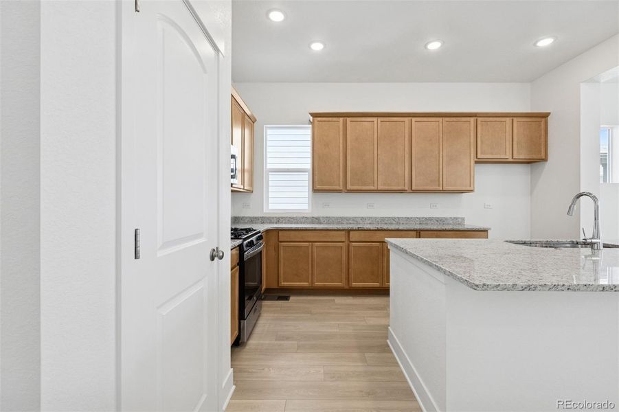 Furnished interior view inside a new home in Painted Prairie Cottage, Aurora (Image 14).