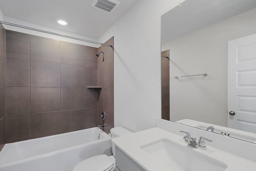 Furnished interior view inside a new home in Heights of Barbers Hill, Baytown (Image 7).