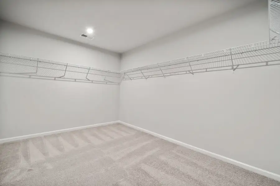 Primary Bedroom Walk In Closet