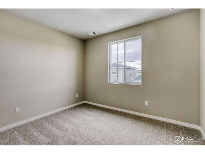 Spacious, unfurnished interior of a new home in Farmstead, Berthoud (Image 31).
