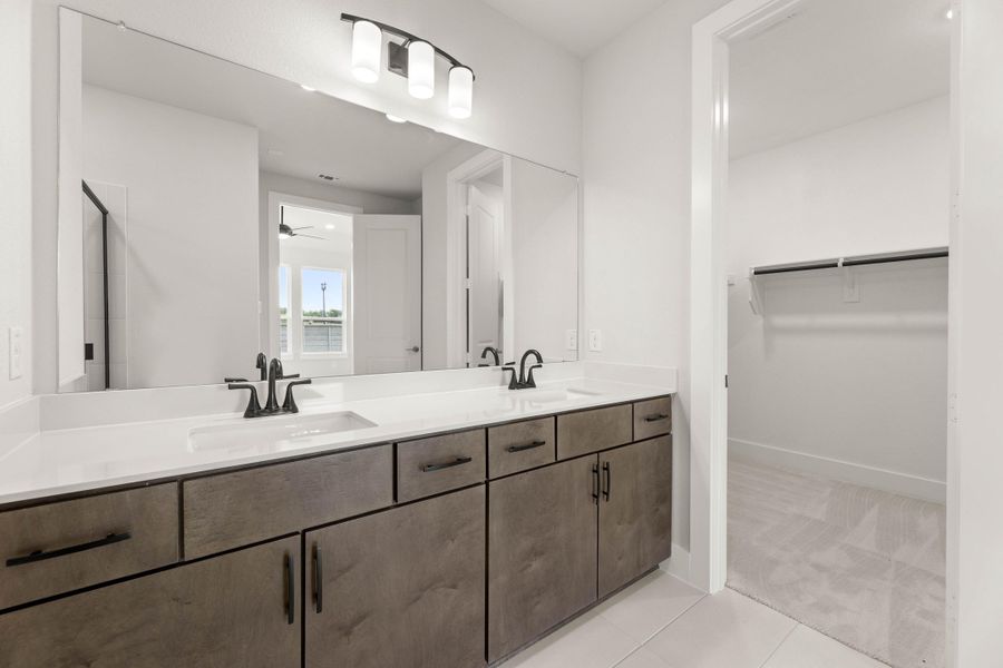 Representative furnished interior of a home built from the Aspen by Tri Pointe Homes in Treeline, Justin (Image 10).