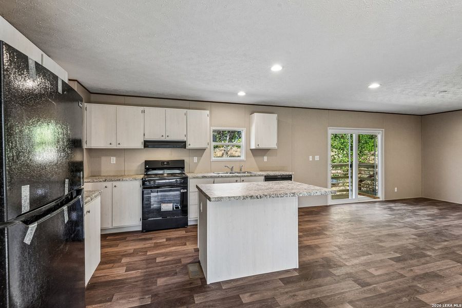 Furnished interior view inside a new home in , Hondo (Image 4).