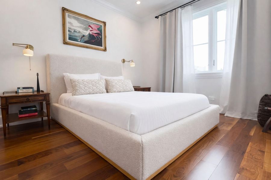 Serene minimalist bedroom with flamingo