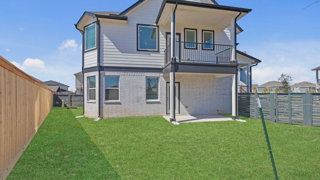 Representative exterior details of a home built from the Oakdale by Chesmar Homes in Bridgeland Courtyard, Cypress (Image 4).
