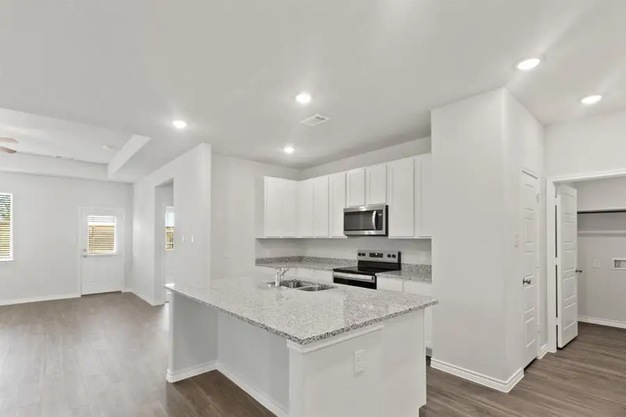 Furnished interior view inside a new home in Retreat at Fossil Creek, Fort Worth (Image 5).