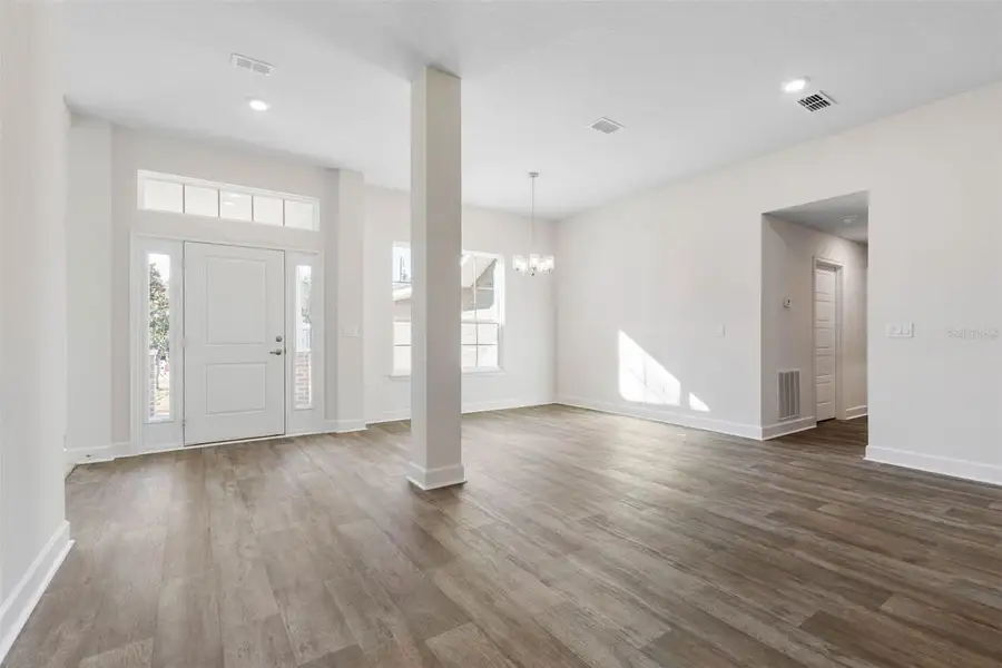 Representative unfurnished interior of a home built from the 2265 by Adams Homes in Royal Highlands, Spring Hill (Image 16).