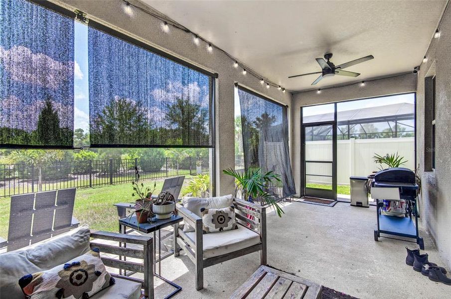 Exterior details and patio area of a home in Bella Lago, Parrish (Image 4).
