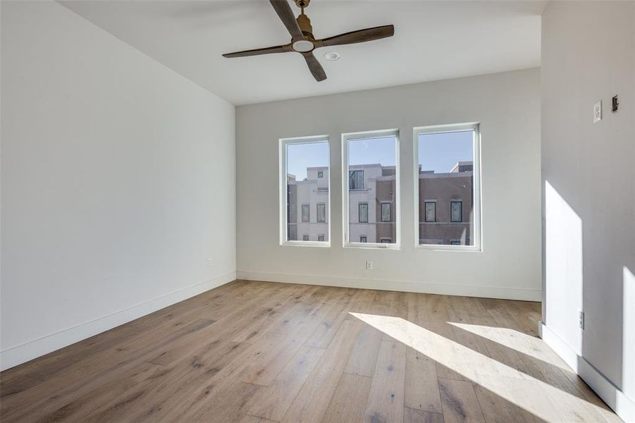 Lots of light in this Primary bedroom.  This home is currently under construction and representative of finish out in #110.