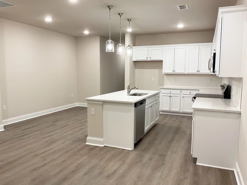 Living Room to Kitchen and Dining Area
