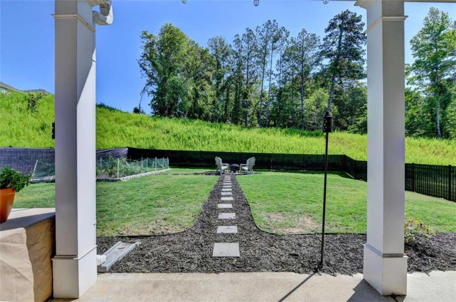 Exterior details and patio area of a home in Twin Lakes, Hoschton (Image 30).