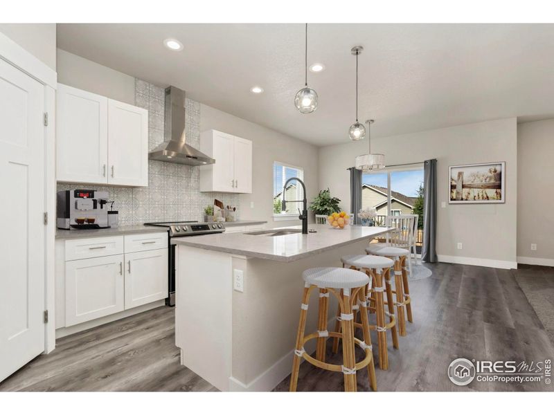 Chef style island kitchen with walk in Pantry