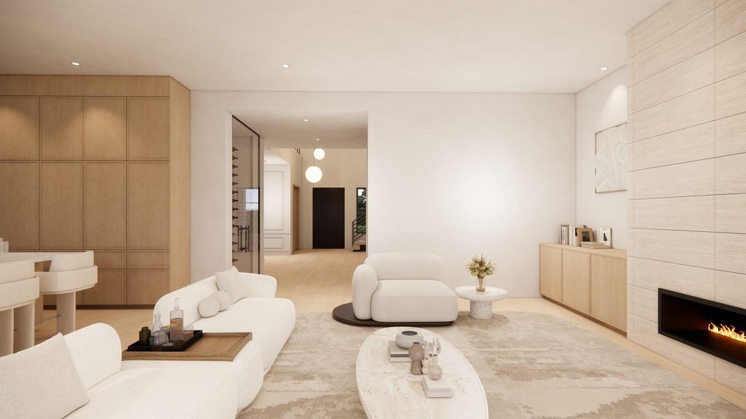 Artist Rendering of Family Room features custom living room built-ins, fireplace w/ tiled surround, wood floors and 12 ft ceilings.