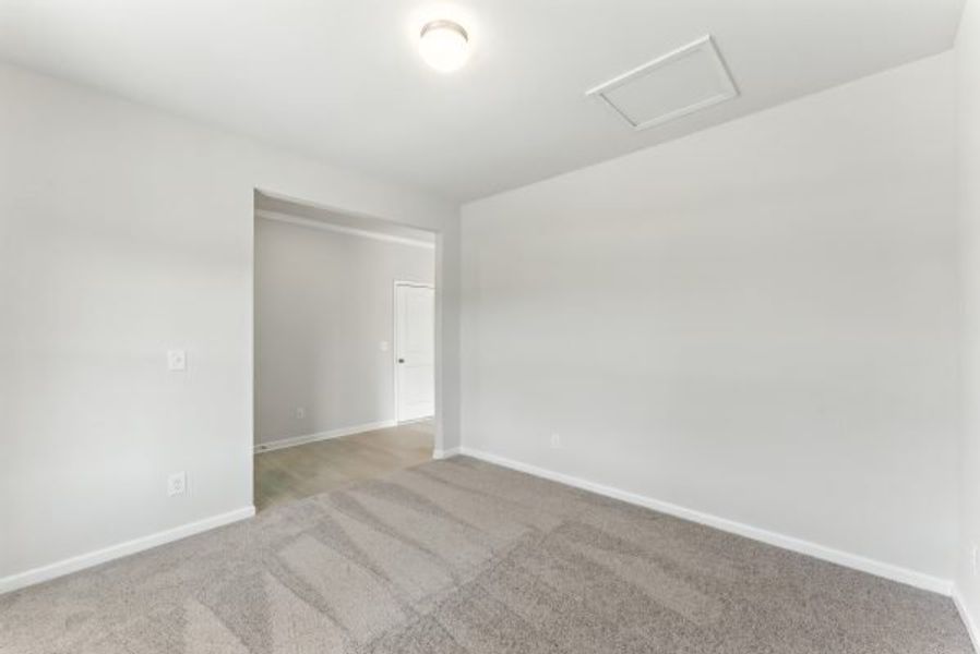 Representative unfurnished interior of a home built from the Brentwood by Piedmont Residential in Falls Creek, Flowery Branch (Image 13).