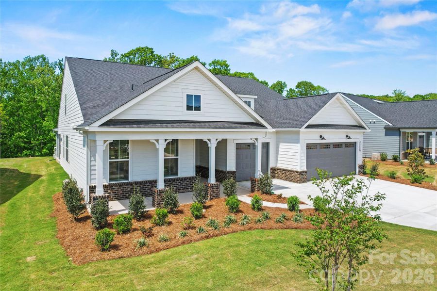 Front exterior of a new home in Carolina Riverside, Belmont, NC, highlighting curb appeal (Image 26).