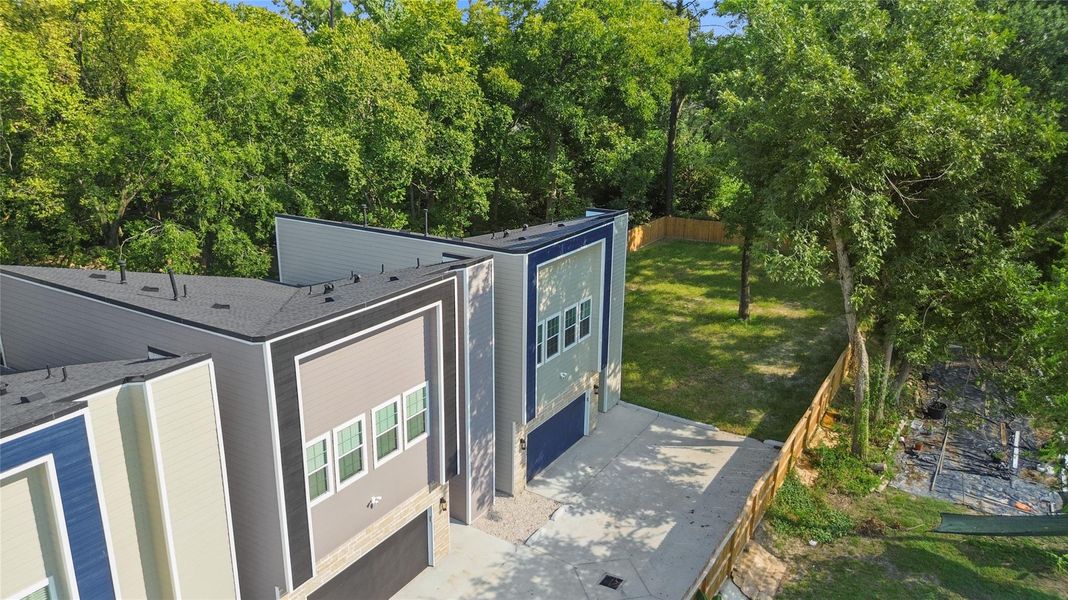 Outside, your home stands tall with clean lines and modern design, nestled alongside lush greenery that gives you both privacy and a peaceful backdrop. Outside, your home stands tall with clean lines and modern design, nestled alongside lush greenery that gives you both privacy and a peaceful backdrop.