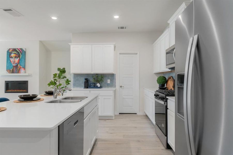 Furnished interior view inside a new home in Fireside by the Lake, Garland (Image 9). Furnished interior view inside a new home in Fireside by the Lake, Garland (Image 9).