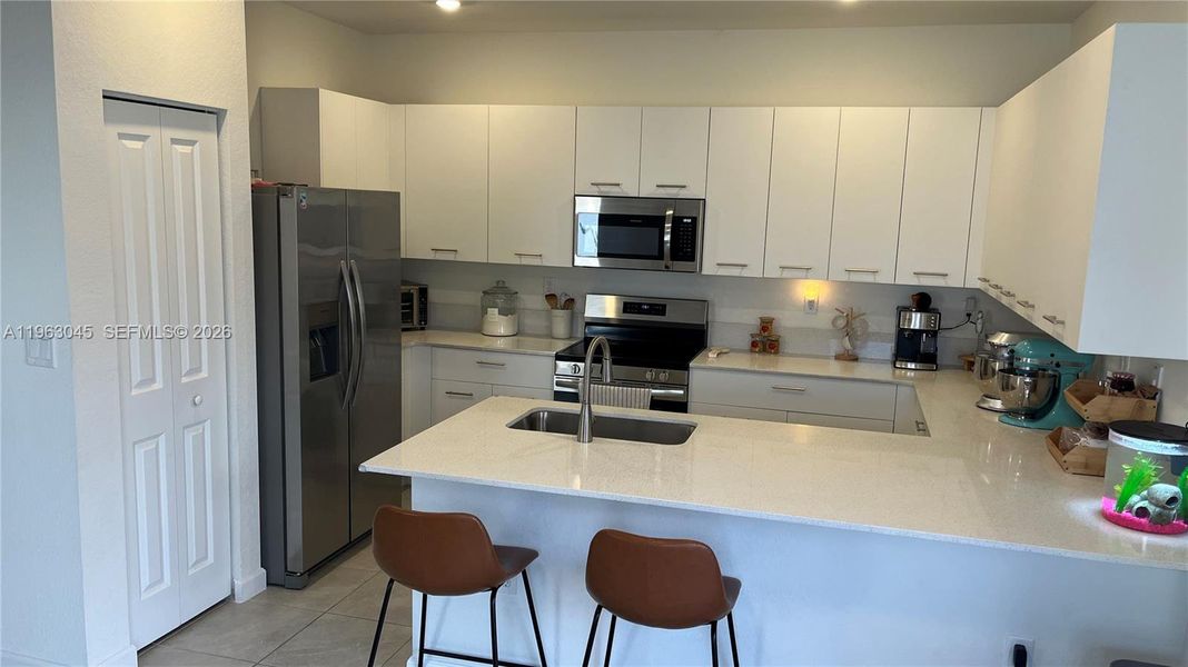 Furnished interior view inside a new home in , Miami (Image 65). Furnished interior view inside a new home in , Miami (Image 65).