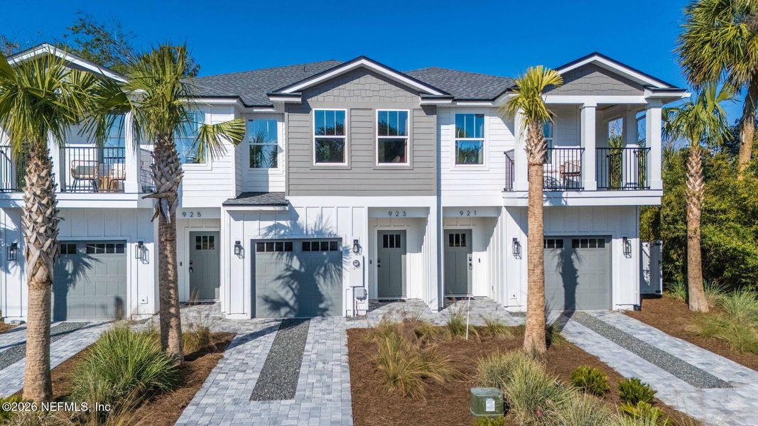 Front exterior of a new home in , Jacksonville Beach, FL, highlighting curb appeal (Image 1). Front exterior of a new home in , Jacksonville Beach, FL, highlighting curb appeal (Image 1).