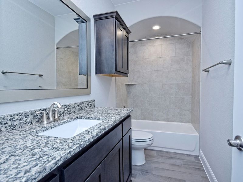 Representative furnished interior of a home built from the San Simeon I by Giddens Homes in Clearwater Ranch, Liberty Hill (Image 305).