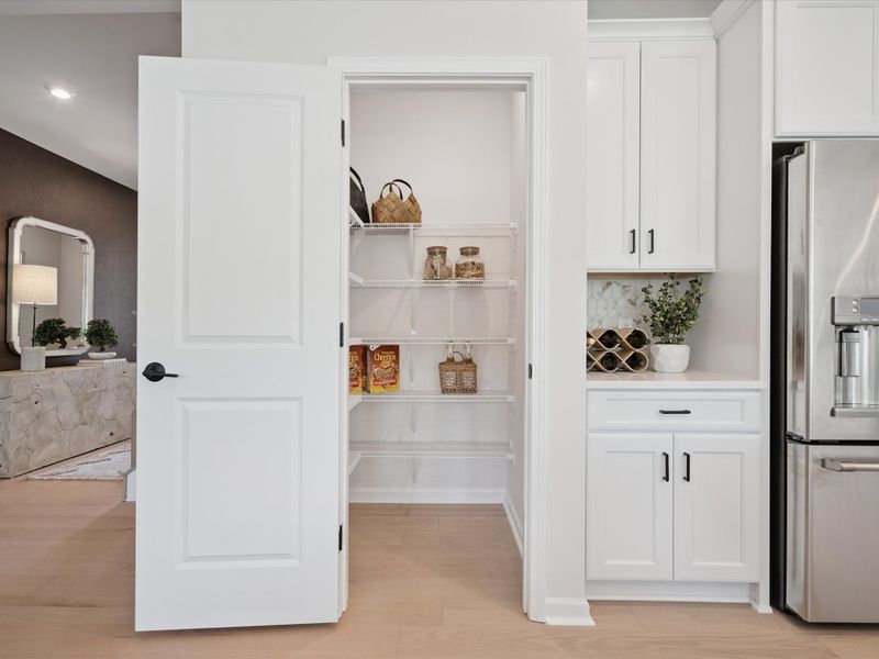 Representative furnished interior of a home built from the Mayes by Tri Pointe Homes in Millstone, Cramerton (Image 10).
