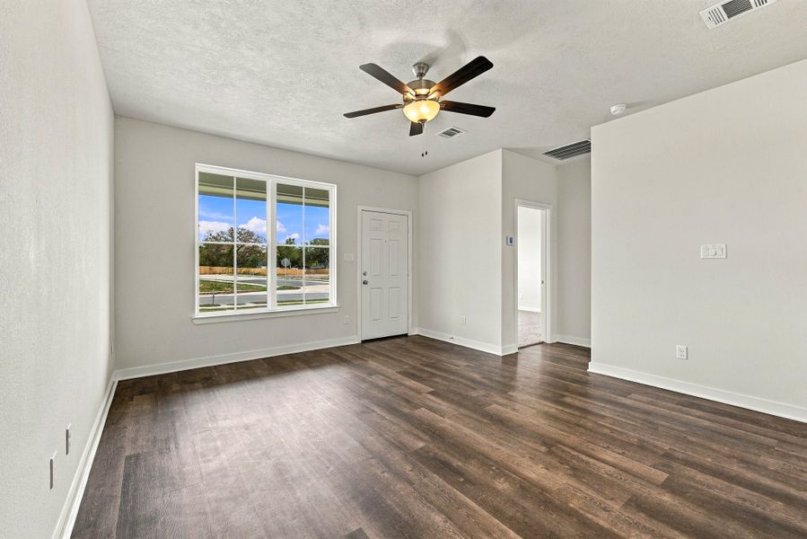 Spacious, unfurnished interior of a new home in The Cottages at Pagosa Springs, Bryan (Image 10).