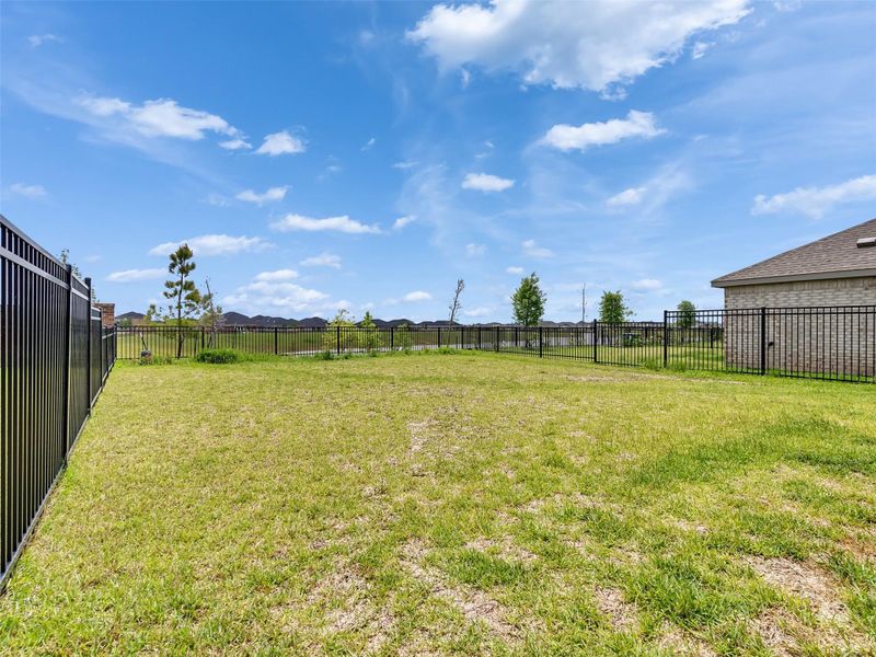 Exterior details and patio area of a home in , Katy (Image 27).