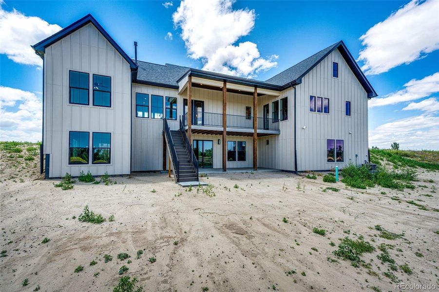 Front exterior of a new home in , Byers, CO, highlighting curb appeal (Image 1).