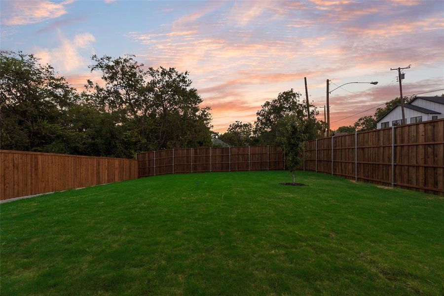 Front exterior of a new home in , Dallas, TX, highlighting curb appeal (Image 26).