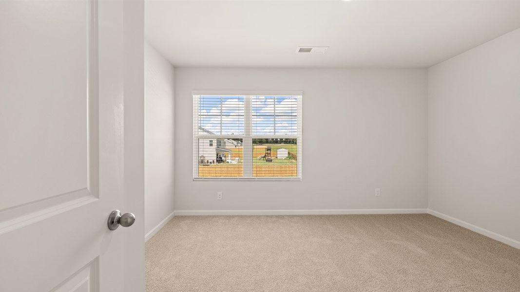 Spacious, unfurnished interior of a new home in Southwind Village, Evans (Image 42).